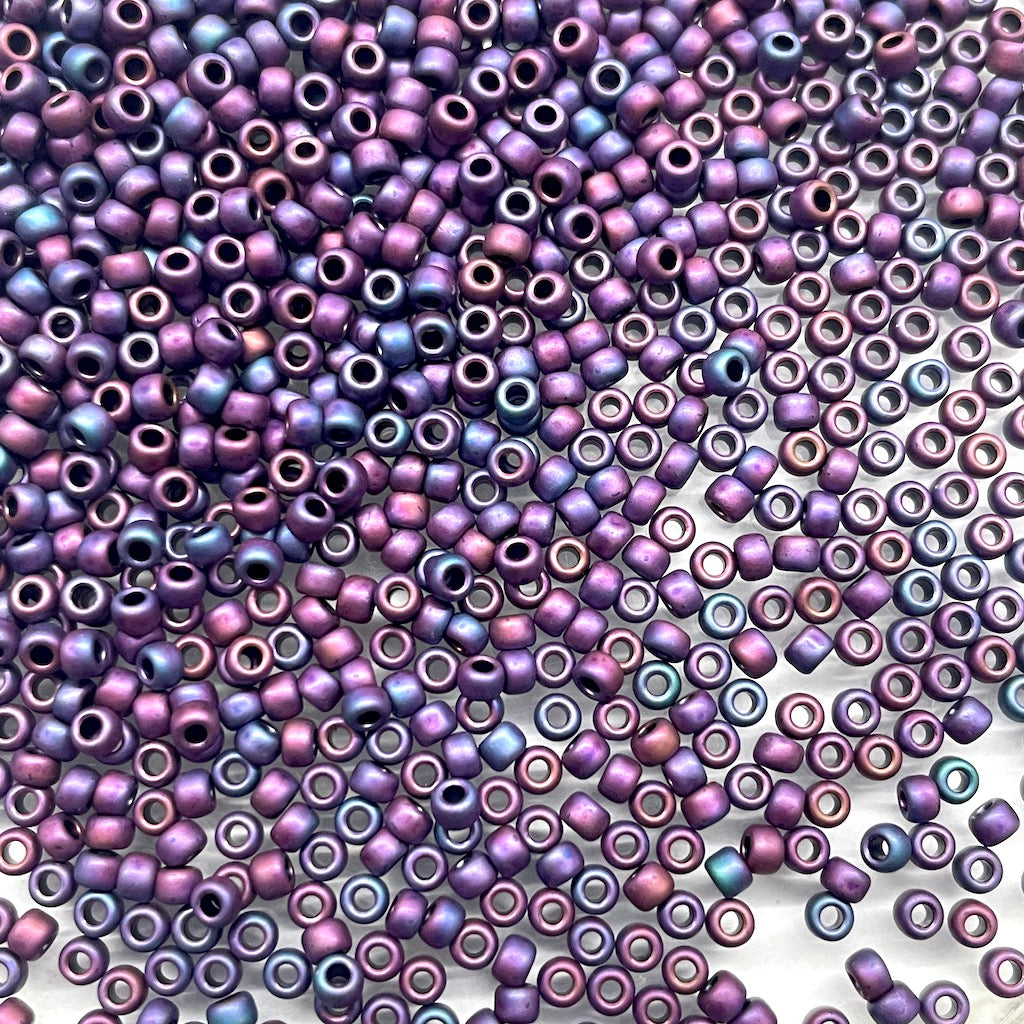 Toho Round Rocailles 11/0 | 704FRR | Morado Matizado con Rojo y Azul Opaco Metalizado