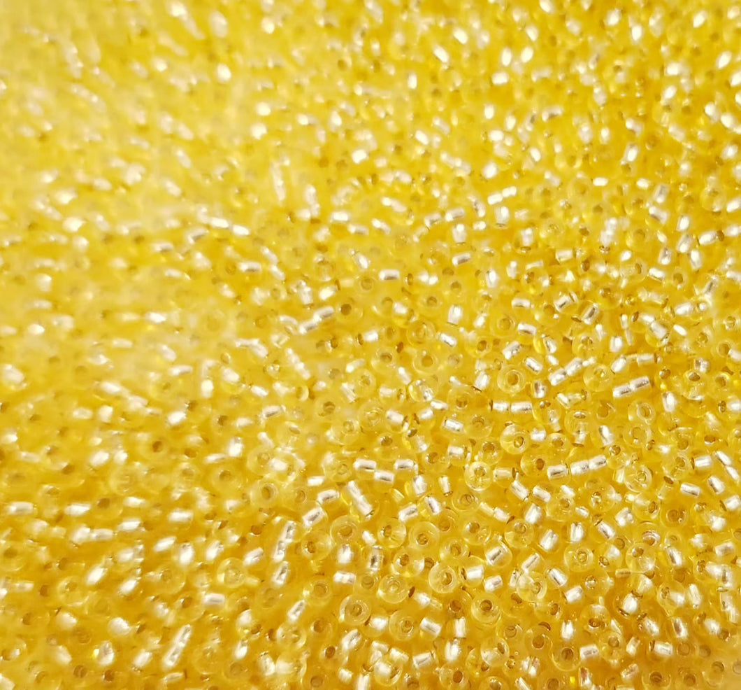 Miyuki Round Rocailles 11/0 | 1902ARR | Silverline Amarillo
