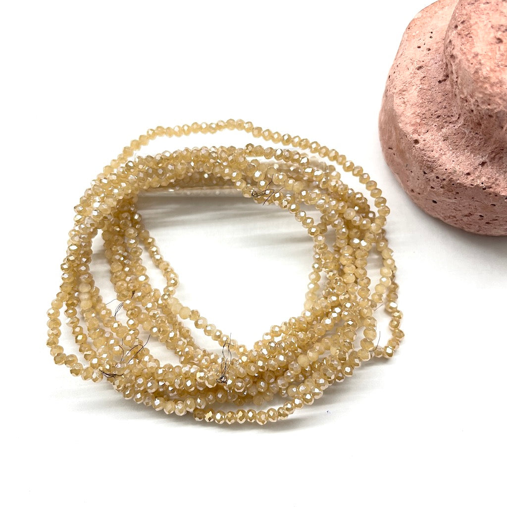 CRISTAL CHATO | 1MM | BEIGE TORNASOL | co.55