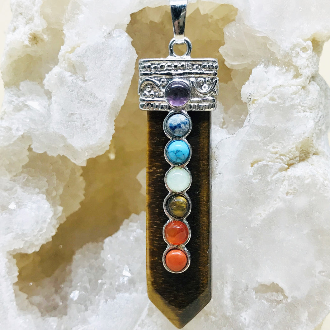 COLGANTE DE PIEDRA | PUNTA PLANA CON 7 CHAKRAS | 60MM | OJO DE TIGRE