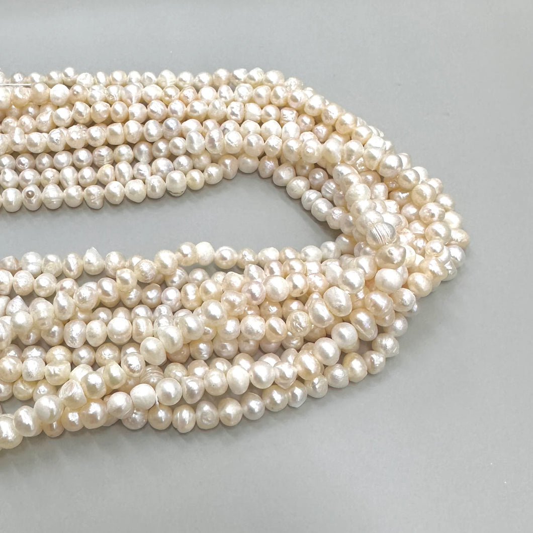 PERLA DE RIO CREMA IRREGULAR | 6MM | HH-6137