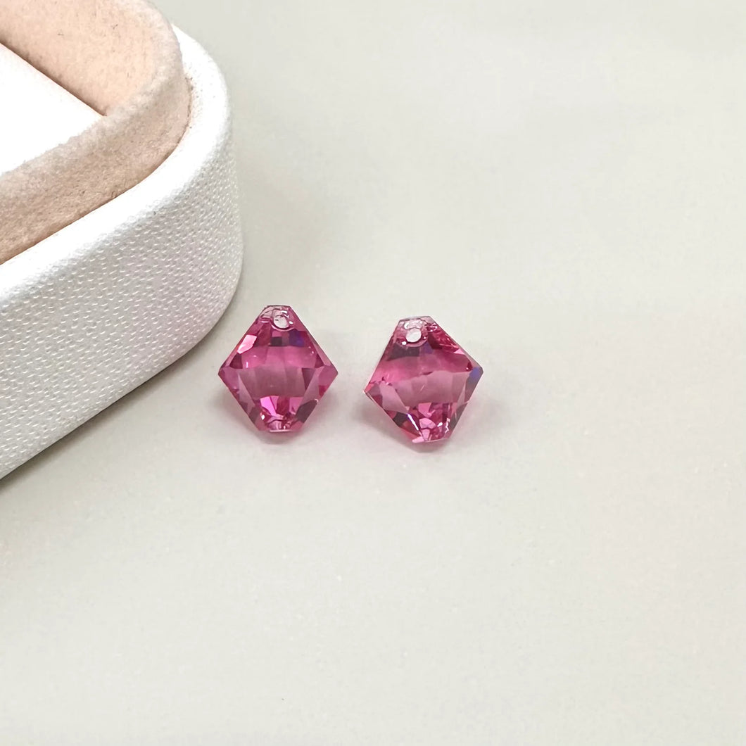 COLGANTE SWAROVSKI | BICONO FUCSIA TRASLUCIDO | 8.7MM