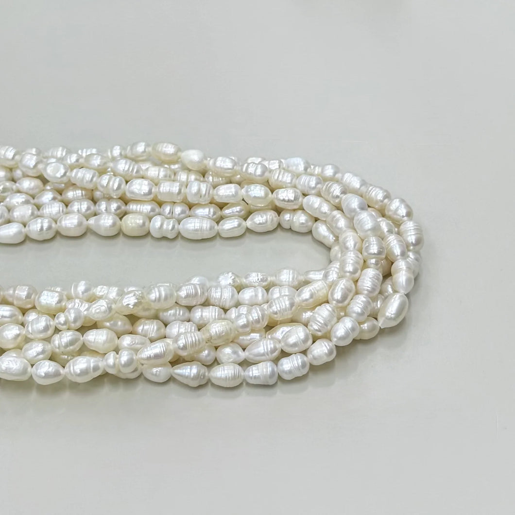 PERLA DE RIO | IRREGULAR | ARROZ | 7X10MM APROX | HH-6510