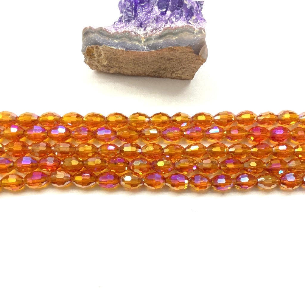 Cristal Arroz | 10x6mm | Naranja Traslucido Tornasol