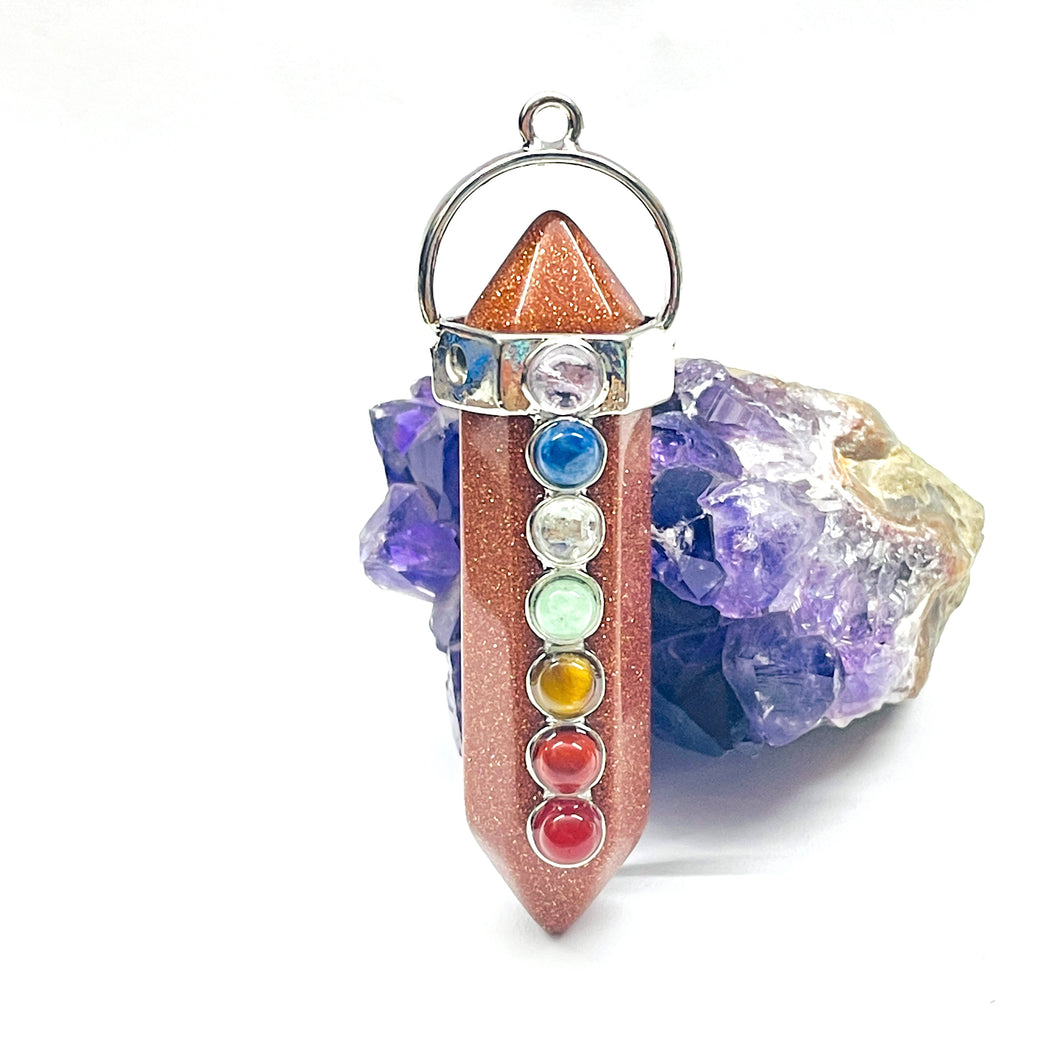 COLGANTE DE PIEDRA | PUNTA GRUESA CON 7 CHAKRAS | 60MM | PIEDRA DEL SOL