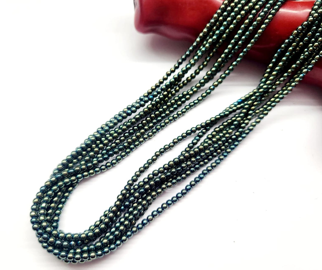 MOSTACILLA DE CRISTAL Y PIEDRA | 2.4MM | VERDE DORADO METALIZADO  | co.18