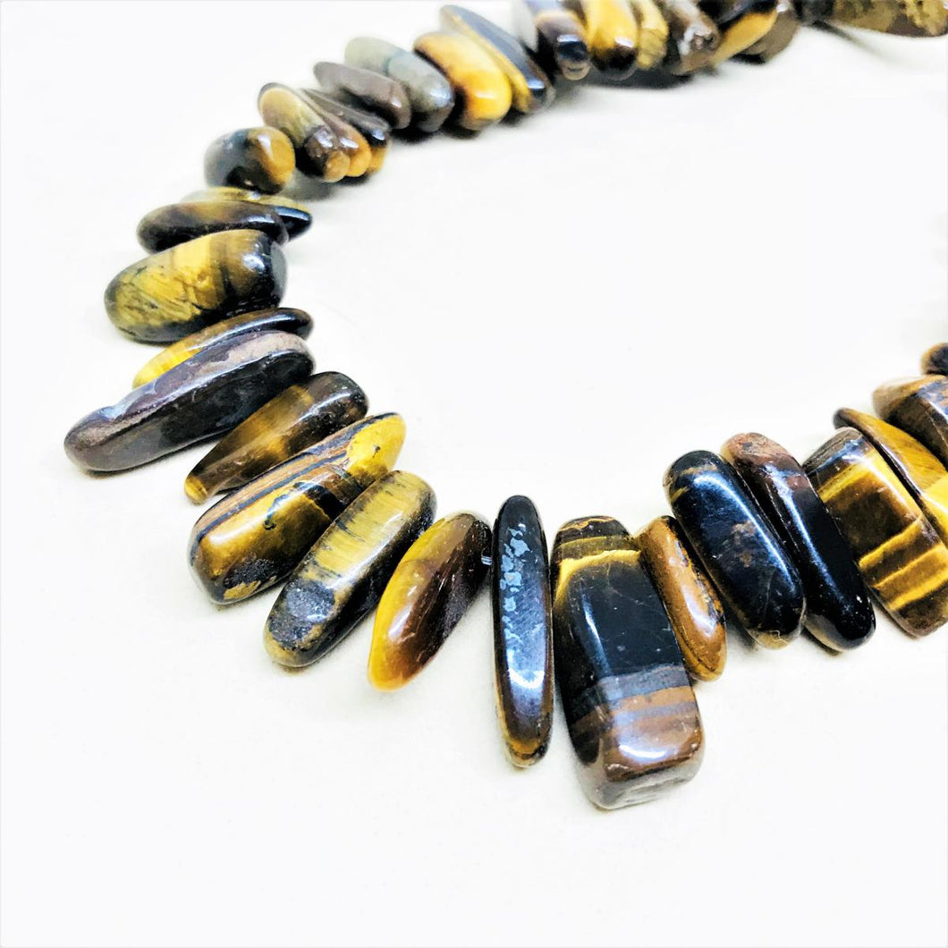 DAGAS OVALADAS | TIRA 40CM | OJO DE TIGRE