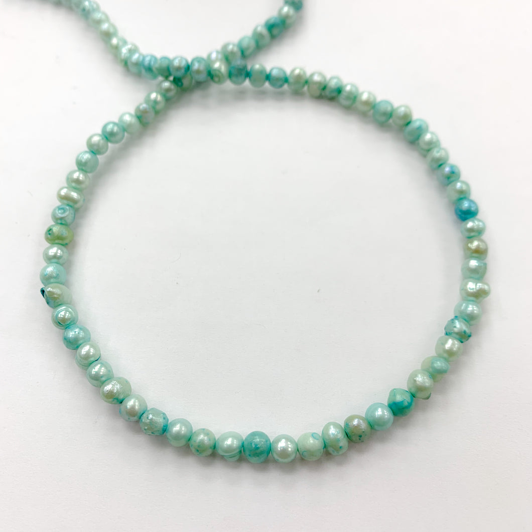 PERLA REDONDA IRREGULAR | CELESTE | 5MM (22-13U)